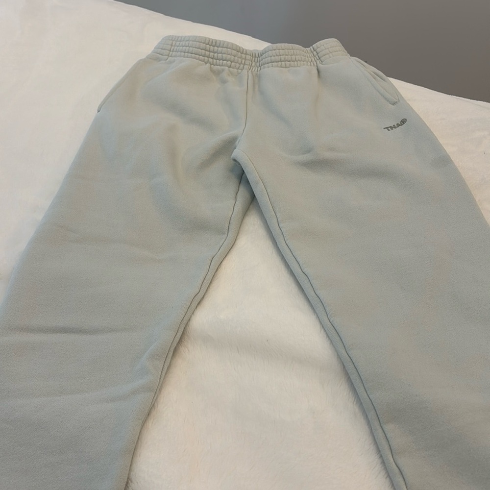 TNA joggers extra small great condition colour is pale blue